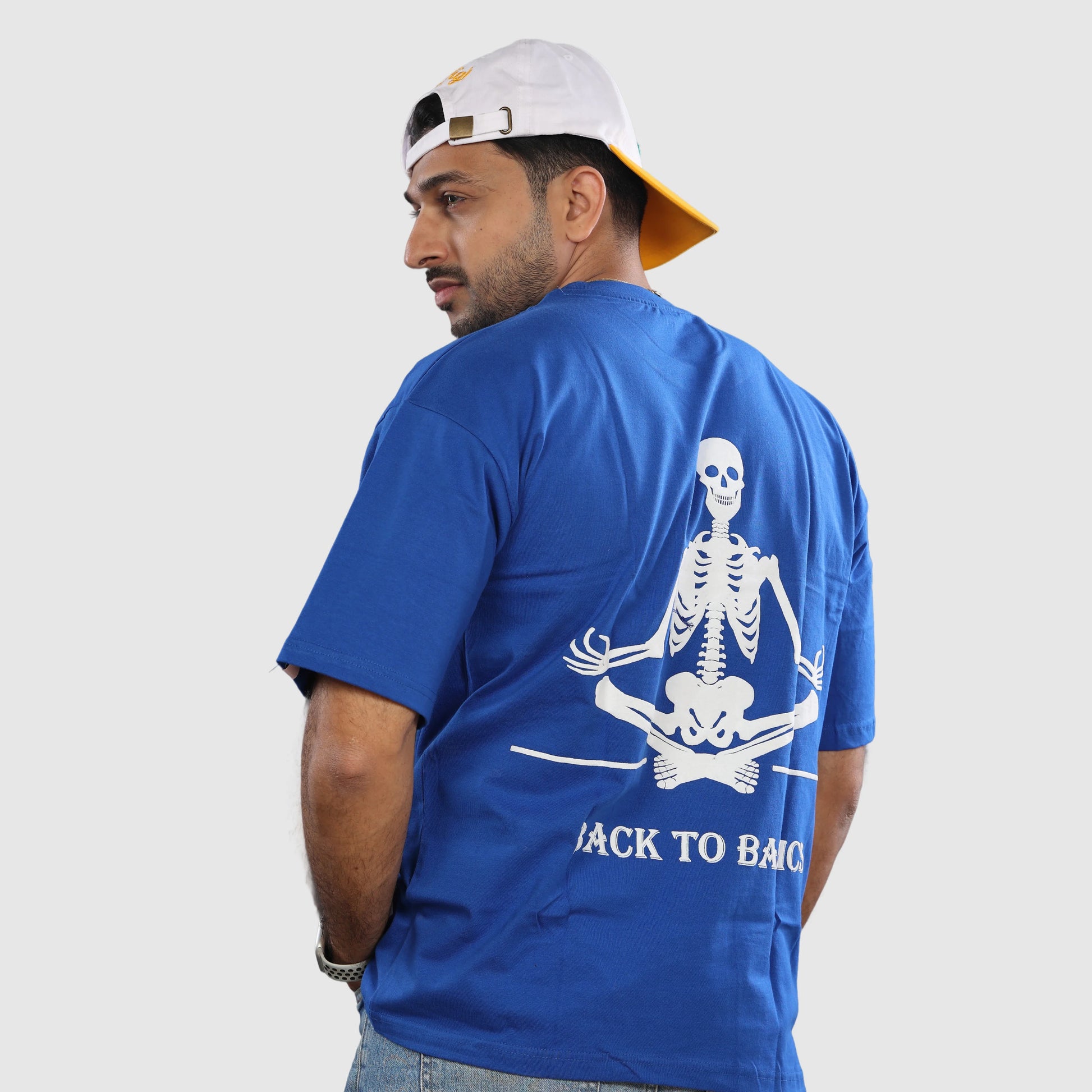 blue t-shirt with a skeleton design.