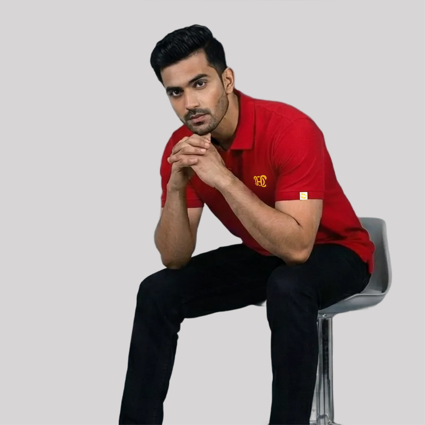 red polo shirt with a logo